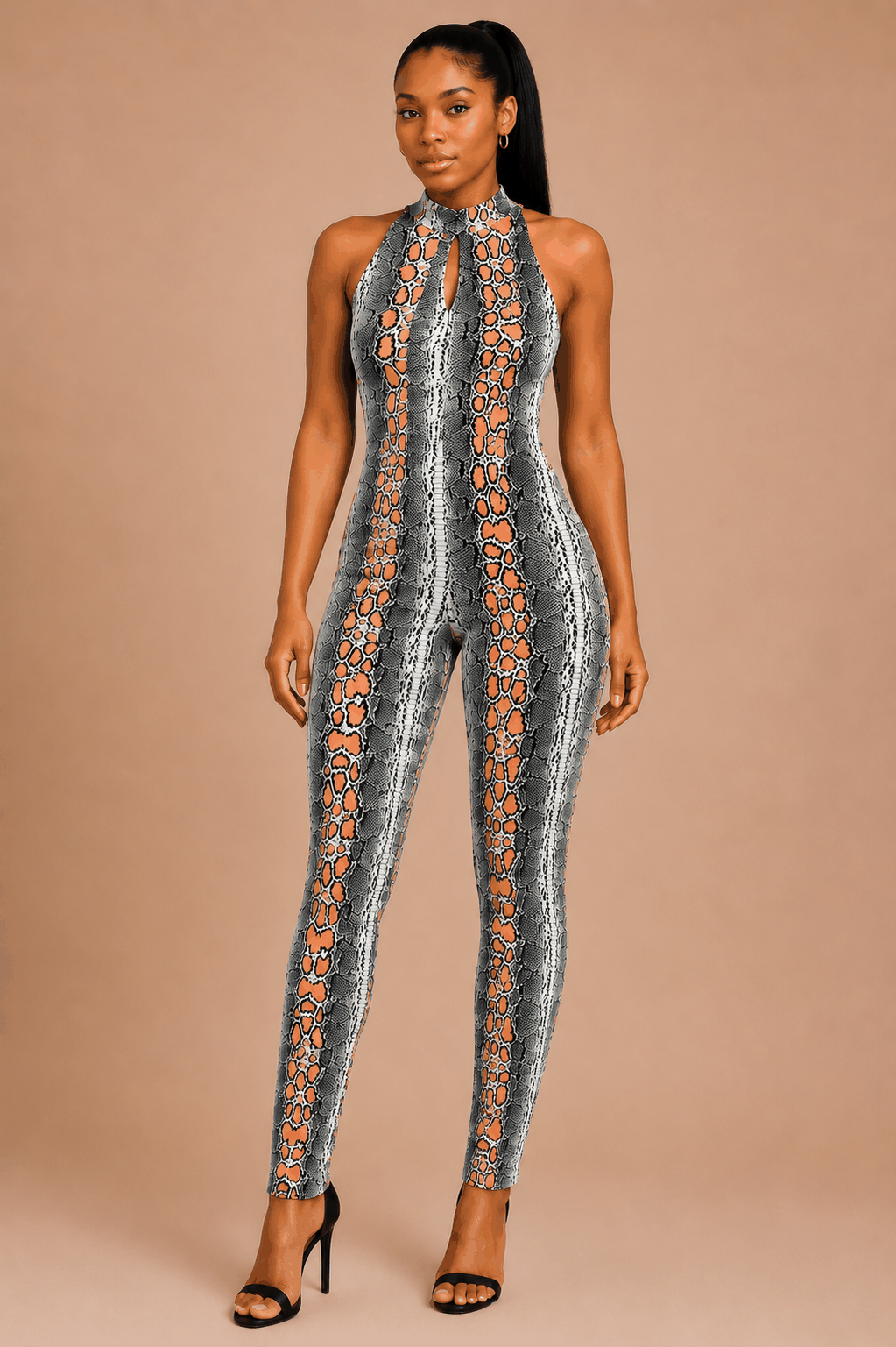 Snake print halter jumpsuit with zip-back and bodycon fit