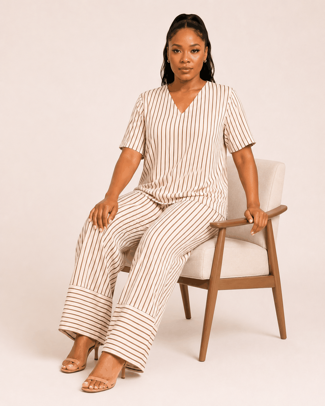 Muse Striped Set featuring a chic striped two-piece summer outfit with crop top and pants for stylish comfort and versatility