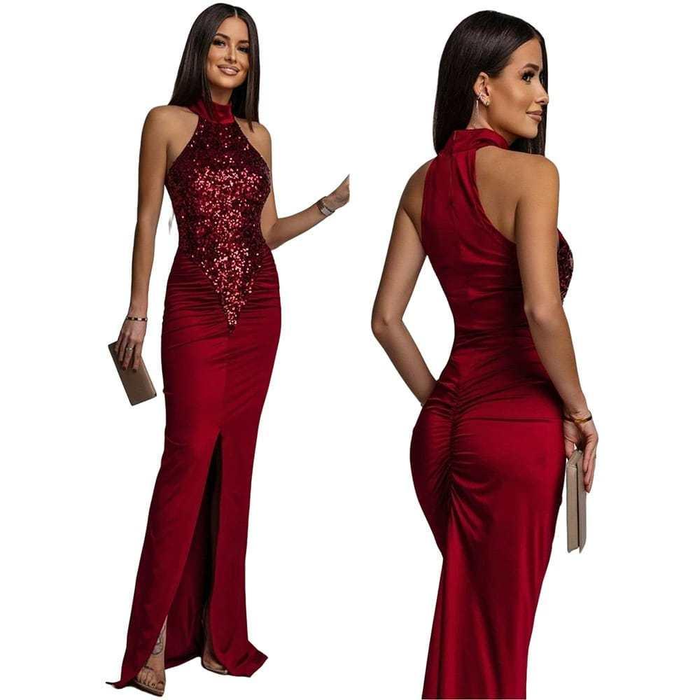 Woman wearing sleeveless red sequin evening gown with high neck and front slit, elegant look