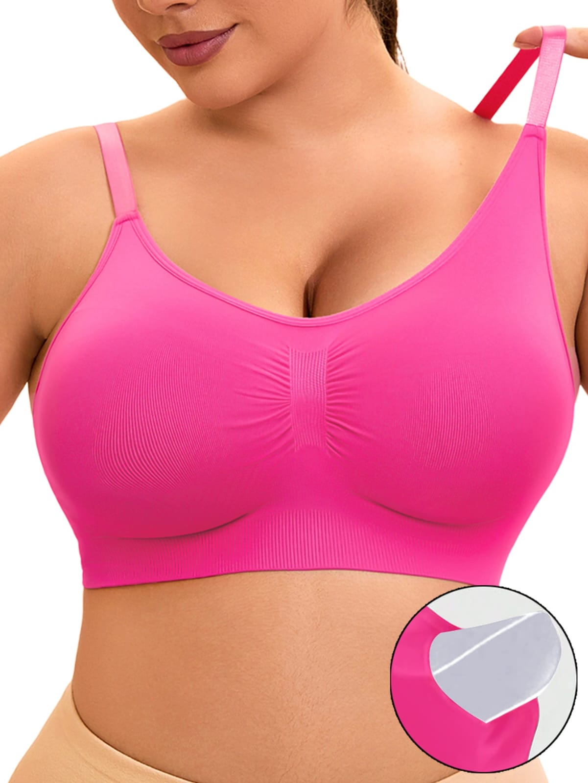 Woman wearing seamless hot pink padded bralette with adjustable straps, close-up view