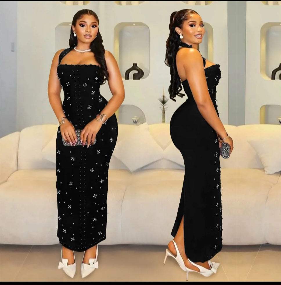Elegant crystal maxi dress with halter neckline and side slit in black on model